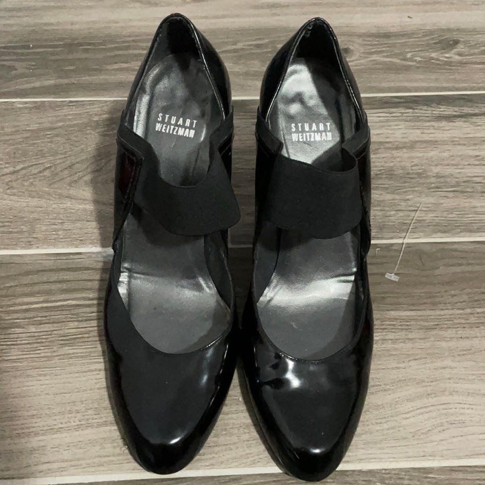 Stuart Weitzman sleek black pumps